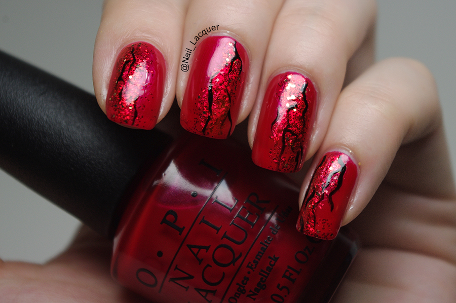 nail art on red nail paint